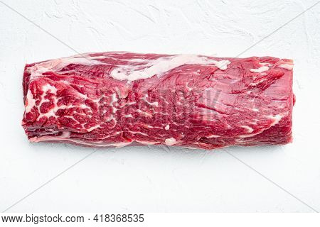 Tenderloin, Or Eye Fillet Cut Raw Marbled Beef Meat Set, On White Stone  Background, Top View Flat L