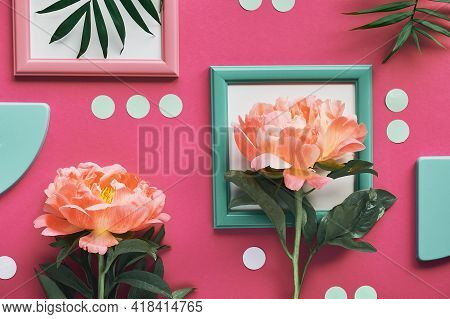 Pink Peony In White Frame, Palm Leaves. Creative Flat Lay On Abstract Geometric Background With Fram