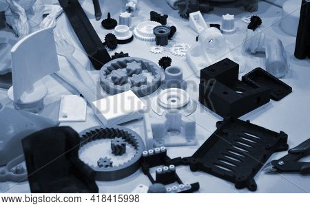 Objects Printed By 3d Printer. Objects Printed On A 3d Printer On A Table.