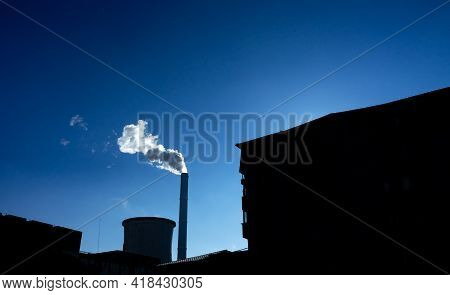 Bucharest, Romania - January 15, 2021: Chimney Of Cet Progresul Power Plant, Pollute With Smoke From