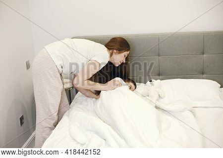 Portrait Of A Mother With Her Baby