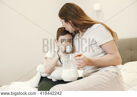 Portrait Of A Mother With Her Baby