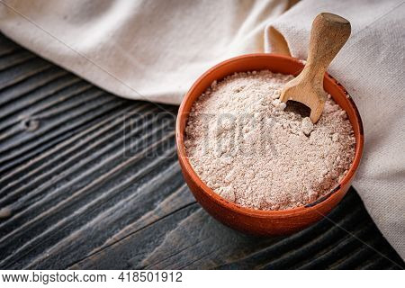 Fresh Natural Buckwheat Flour On A Dark Wooden Rustic Background Culinary Concept