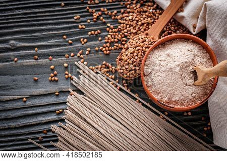 Fresh Natural Buckwheat Flour On A Dark Wooden Rustic Background Culinary Concept