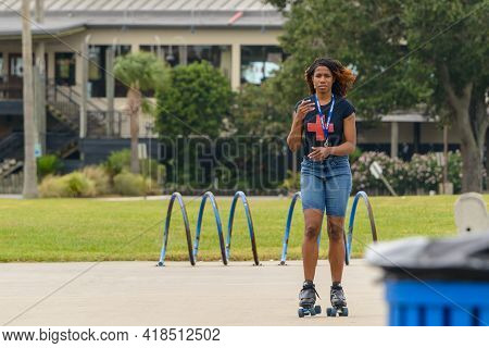 New Orleans, La, Usa - October 9: Young Woman Roller Skates Along The Lakefront On October 9, 2020 I