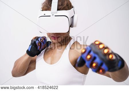 Close Up Shot Of Asian Woman Wearing Vr Headset To Exercise With Simulation Boxing Games, Young Fema