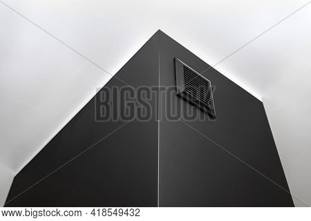 A Ventilation Grille In A Modern Fireplace With A Closed Combustion Chamber In The Living Room In Bl