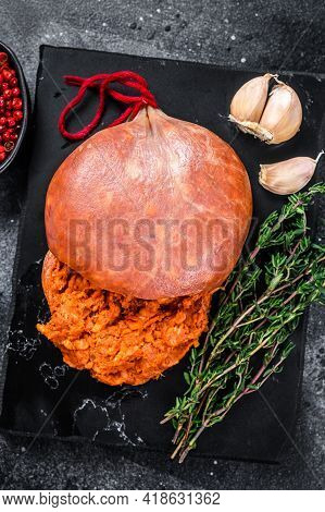 Balearic Sobrassada Cured Meat Sausage From Ground Pork, Paprika And . Black Background. Top View