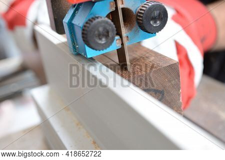 Cutting Of Ovangkol Wooden Plate On Band Saw. Guitar Making