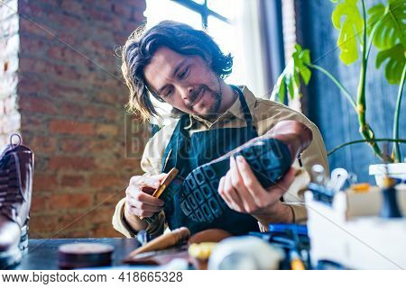 Hobby Became A Small Business Leather Man In Apron Is Making A Leather Wallet And Shooes In Studio