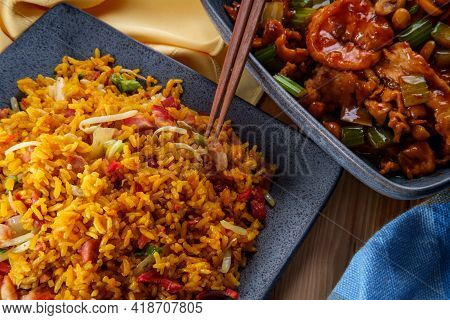 Takeout Chinese Kung Pao Chicken And Shrimp With Peanuts And Side Of Pork Fried Rice