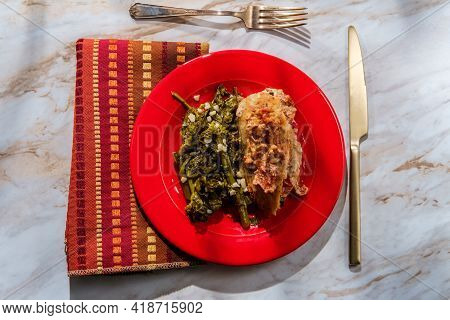 Goat Cheese Stuffed Chicken With Sundried Tomatoes And Side Of Garlicky Broccoli Rabe