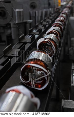 Long Conveyor Line For Production Of Electric Motors. Industrial Company Manufacture - Stators On As