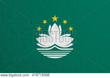 Flag Of Macau. Brick Wall Texture Of The Flag Of Macau.