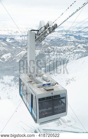 Kasprowy Wierch, Poland 28.01.2021 - Cable Car In The Snowy Landscape. Shot Is Taken During The Dayt