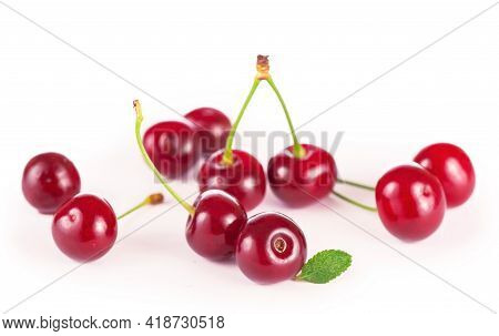 Ripe Fresh Red Cherry Isolated On White Background. With Clipping Path.