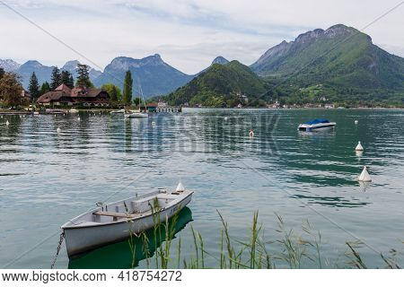 White boat on the Lake of Annecy in the french Alps