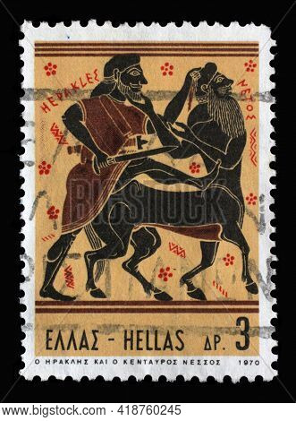 ZAGREB, CROATIA - SEPTEMBER 18, 2014: Stamp printed in Greece shows Hercules Deeds - Hercules and Centaur Nessus, circa 1970