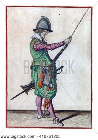 A soldier, full-length, to the right, holding a rudder (a certain type of firearm) by his left thigh with his left hand and sliding the ramrod in the holder under the barrel with his right hand