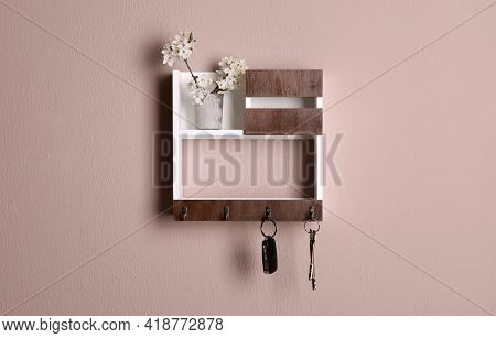 Wooden Hanger For Keys On Color Wall