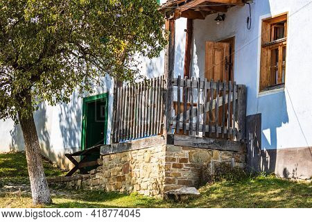 View Of Picturesque Village Viscri In Romania. Painted Traditional Old Houses In Medieval Saxon Vill