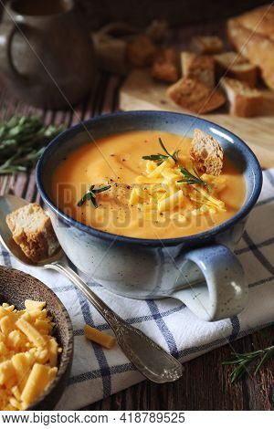 Brighton Soup. Carrot And Potato Cream Soup With Cheddar Cheese. Rustic Style