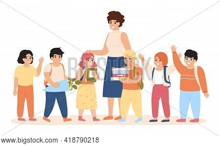 Pupils And Teacher. Happy Kids And Female Teacher Standing Together, Young Woman Teacher With Pupils