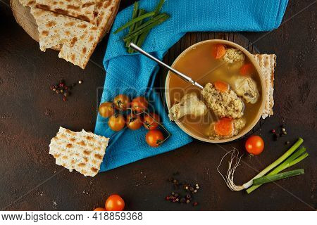 Soup With Matzo Dumplings And Chicken With Carrots And Tomatoes. Healthy Food For Passover