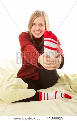 Girl Holding Her Foot