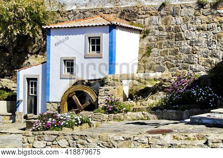 Beautiful And Colorful Waterwheel In Azenhas Do Mar In Lisbon, Portugal. Name Of The Village ,azenha