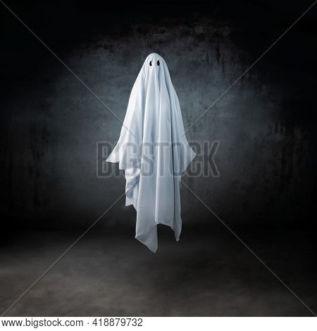 Ghost in a sheet floating in the air