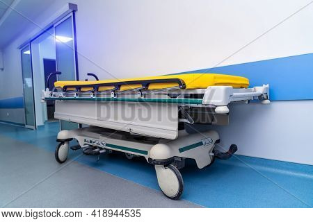 New Modern Trolley Or Cart For Patients In Hospital Corridor. Up-to-date Cart. Blue And White Toning