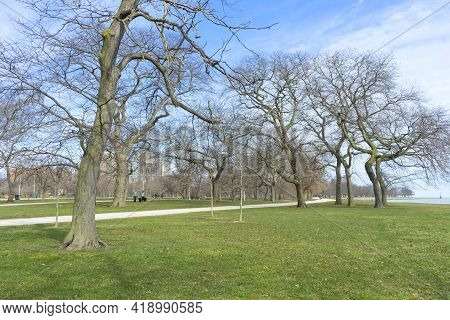 Burnham Shores Park By Lake Michigan In Chicago, Spring Landscape Of Green Field.