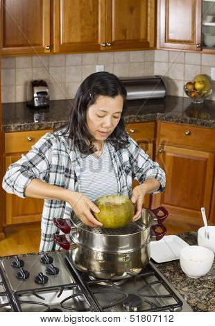 Transferring Cooked Winter Melon From Cooking Pot To Dinner Plate