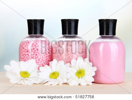 Aromatherapy minerals - colorful bath salt on light background