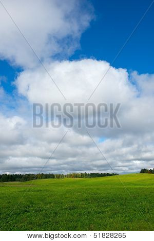 Landscape with cloudy sky background.Big cloudy sky background,Lithuania.Lithuanian nature