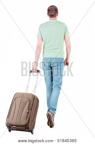 back view of walking  man  with suitcase. brunette guy in motion. backside view of person. Rear view people collection. Isolated over white background. man with a travel bag away from us into distance