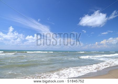 Restless sea on sandy beach Marina di Vecchiano nearby Pisa, Tuscany in Italy