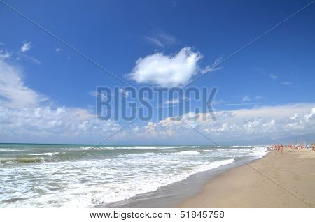 Restless sea on sandy beach Marina di Vecchiano nearby Pisa, Tuscany in Italy