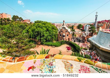 BARCELONA, SPAIN - JULY 19: Ceramic mosaic Park Guell on July 19, 2013 in Barcelona, Spain. Park Guell is the famous architectural town art designed by Antoni Gaudi and built in the years 1900 to 1914