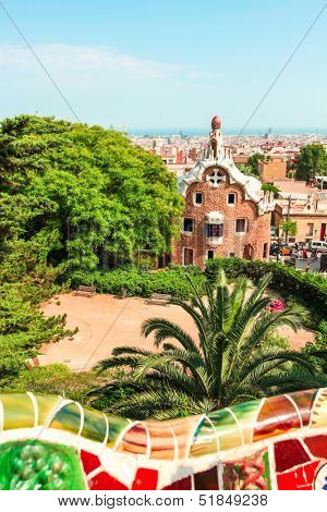 BARCELONA, SPAIN - JULY 19: Ceramic mosaic Park Guell on July 19, 2013 in Barcelona, Spain. Park Guell is the famous architectural town art designed by Antoni Gaudi and built in the years 1900 to 1914
