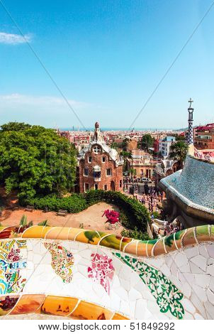 BARCELONA, SPAIN - JULY 19: Ceramic mosaic Park Guell on July 19, 2013 in Barcelona, Spain. Park Guell is the famous architectural town art designed by Antoni Gaudi and built in the years 1900 to 1914