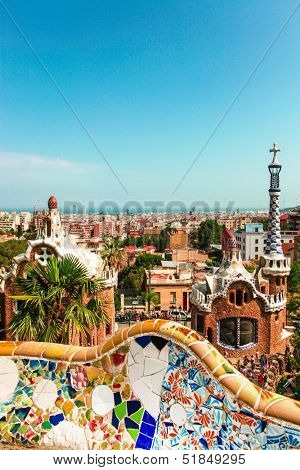 BARCELONA, SPAIN - JULY 19: Ceramic mosaic Park Guell on July 19, 2013 in Barcelona, Spain. Park Guell is the famous architectural town art designed by Antoni Gaudi and built in the years 1900 to 1914