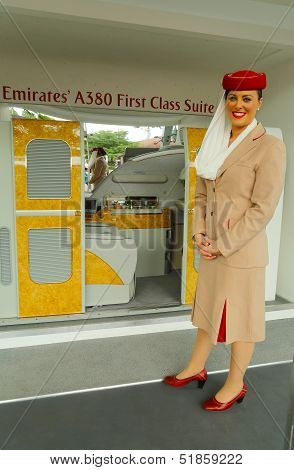 Emirates Airline flight attendant at the Emirates Airline booth at the US Open 2013