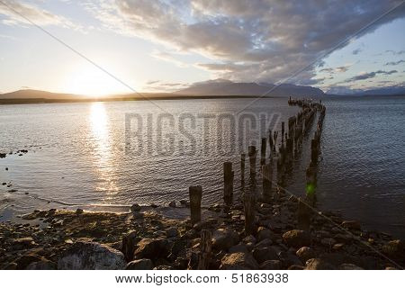 Sunset At The Coastline Of Puerto Natales.