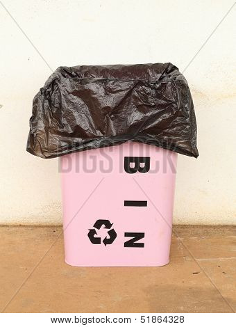 Trash Can With A Plastic Bag