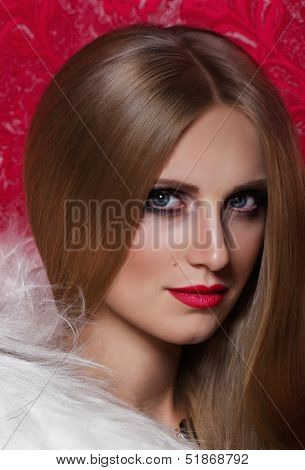Beautiful young woman in fashion clothes