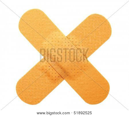 Plaster bands in cross shape
