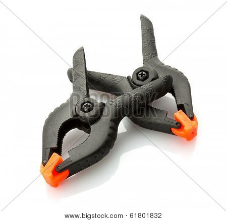 Plastic clamps on white background