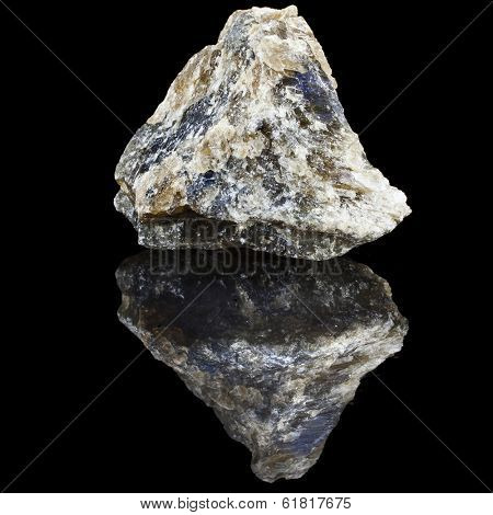 Labradorite with reflection on black surface background 